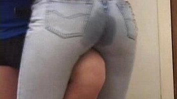 Hot girl getting wet in those tight jeans