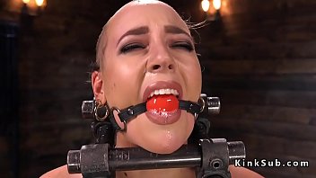 Master puts trimmed head slave Lilith Luxe in device bondage with gag ball in mouth and vibrates her hairy pussy