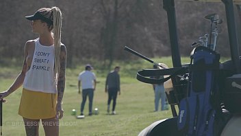 Nude girl playing Golf