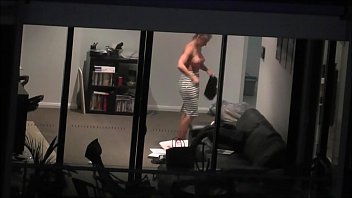 Spying on Busty Blonde MILF Naked Through Apartment Window