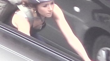 Chick with boobs on a bike
