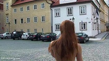 sweet redhead denisa shows her hot body on public streets