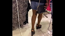 Denim miniskirt and nylon shopping