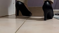Crushing a bigger and longer box with black leather high heels